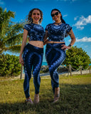 Two girls posing in matching tie dye outfits made by dimples dyes